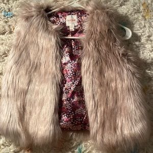 This is a cat & jack vest that was thrifted.